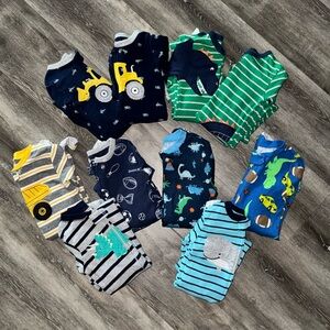 Carter’s set of 10 Long Sleeve Footed Pajamas